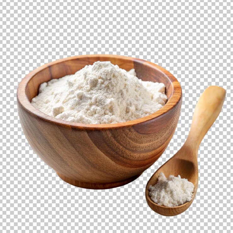 a wooden bowl of flour and wooden spoon on white