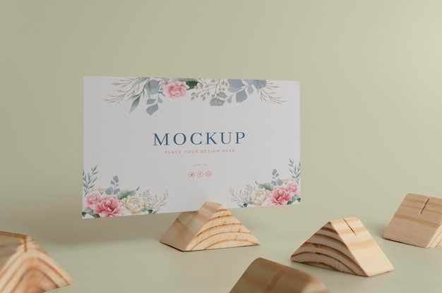 PSD wooden card holder with floral card mockup