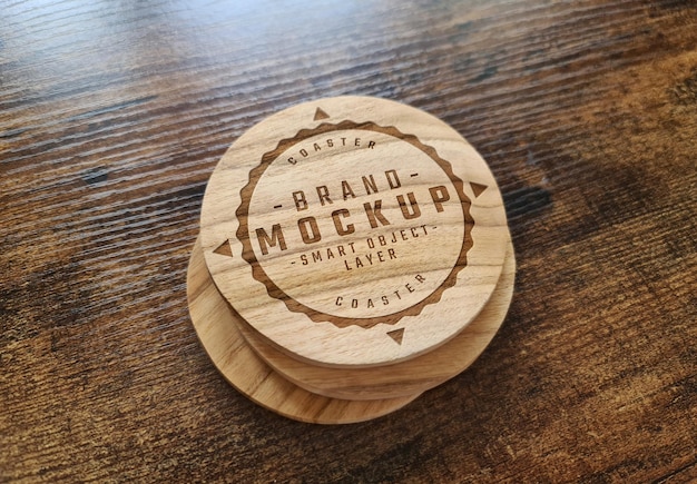 Wooden coaster stack with engraved logo mockup