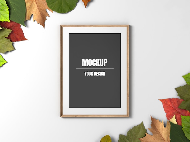 Wooden photo frame mockup and maple leaves