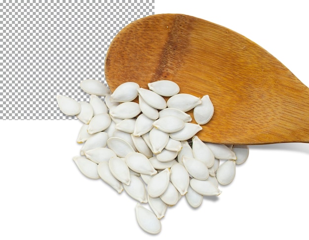 In a wooden spoon and around the spoon lie pumpkin seeds isolated on a transparent background