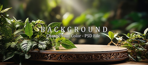 PSD wooden table and green plants on blurred background