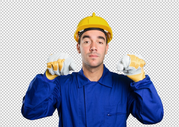 Worker holding an imaginary poster on white background