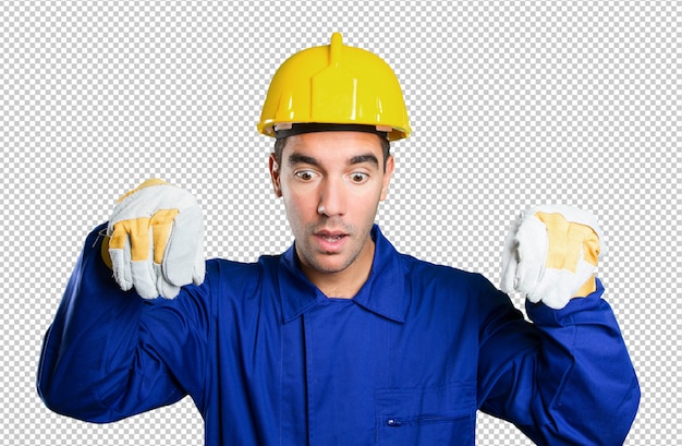 Worker holding an imaginary poster on white background