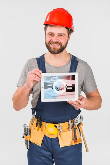 Worker holding tablet mockup for labor day