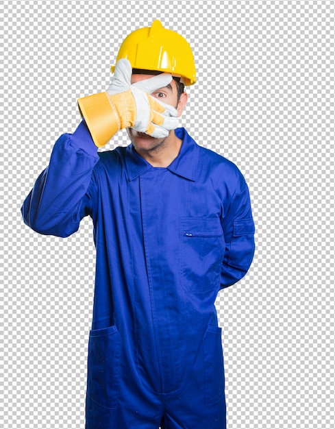Workman covering his eyes with his hands on white background