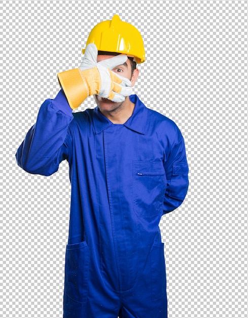 PSD workman covering his eyes with his hands on white background