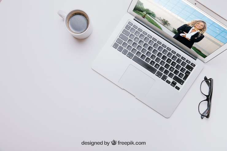 PSD workspace composition with laptop and coffee