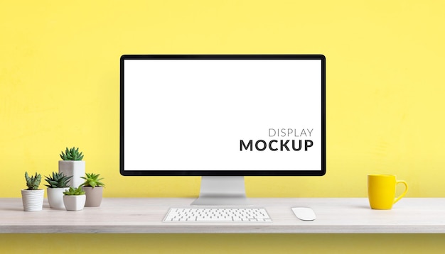 Workspace computer display mockup with yellow background