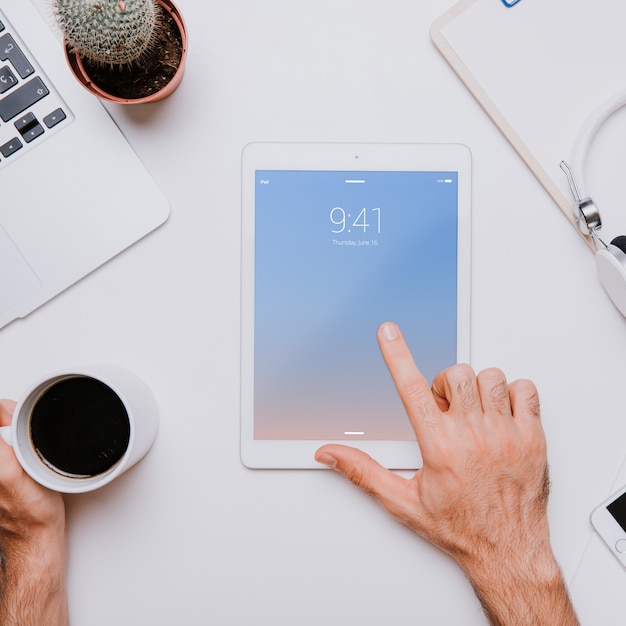 Workspace concept with finger touching tablet