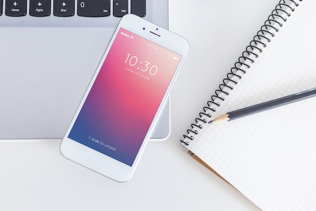 workspace mockup with laptop and smartphone
