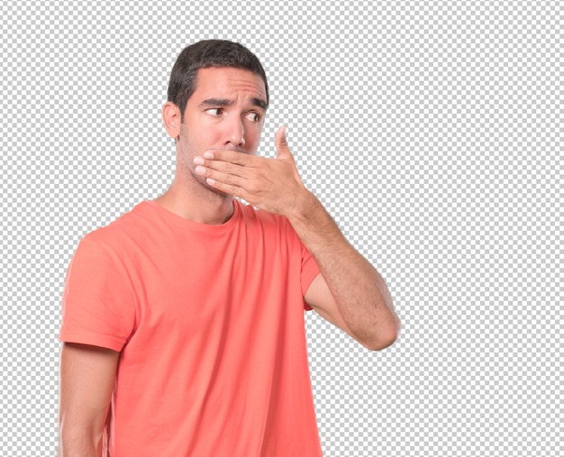 PSD worried young man covering his mouth with the hand