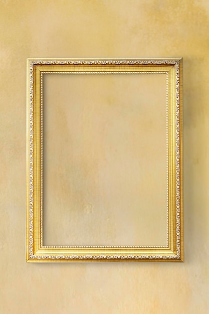 PSD yellow classic photo frame on a yellow wall