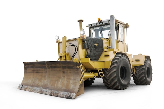 Yellow heavy wheeled tractor isolated