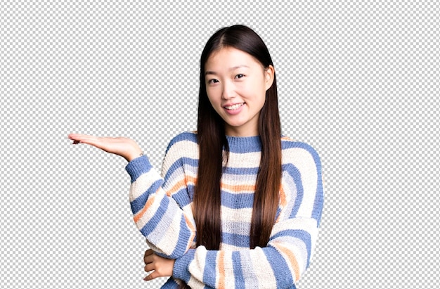Young adult pretty asian expressive woman with a copy space to the side