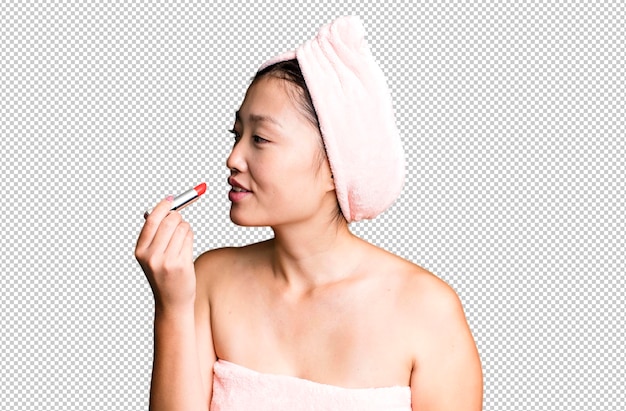 Young adult pretty asian woman with a lipstick beauty concept