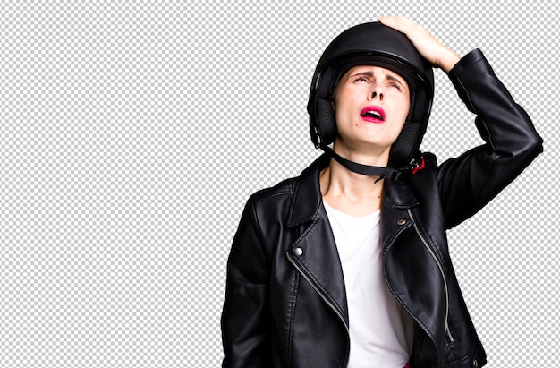 young adult pretty woman motorbike rider with leather jacket and helmet