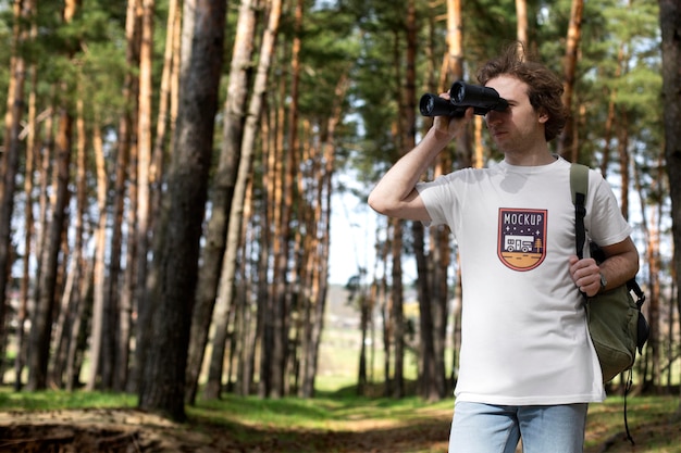 Young adult wearing forest apparel tshirt