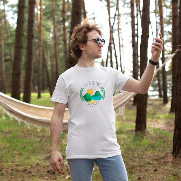 Young adult wearing forest apparel tshirt