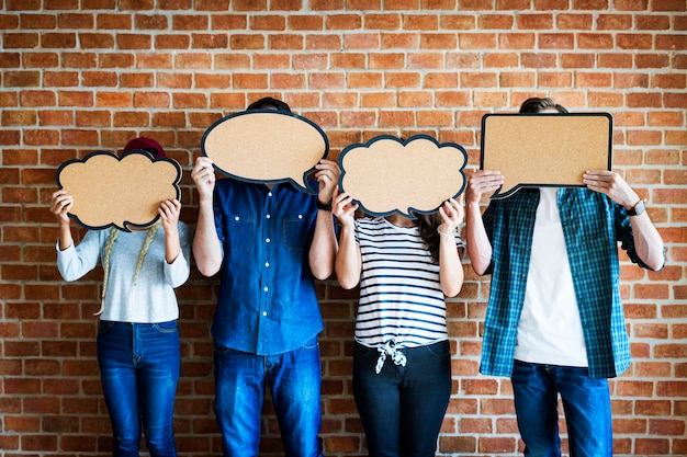 PSD young adults holding up copyspace placard thought bubbles