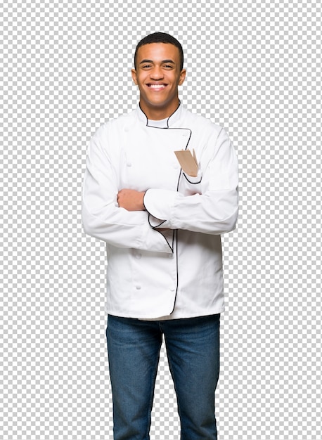 Young afro american chef man happy and smiling