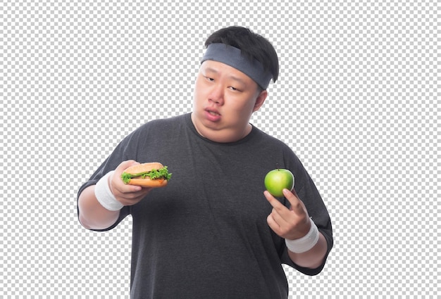 PSD young asian funny fat sport man holding hamburger and green apple psd file
