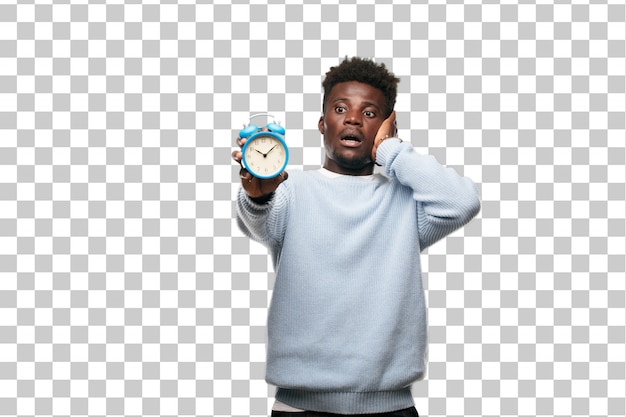 Young black  man with an alarm clock