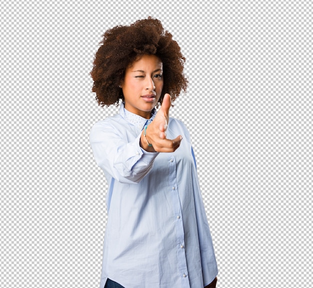 PSD young black woman touching screen