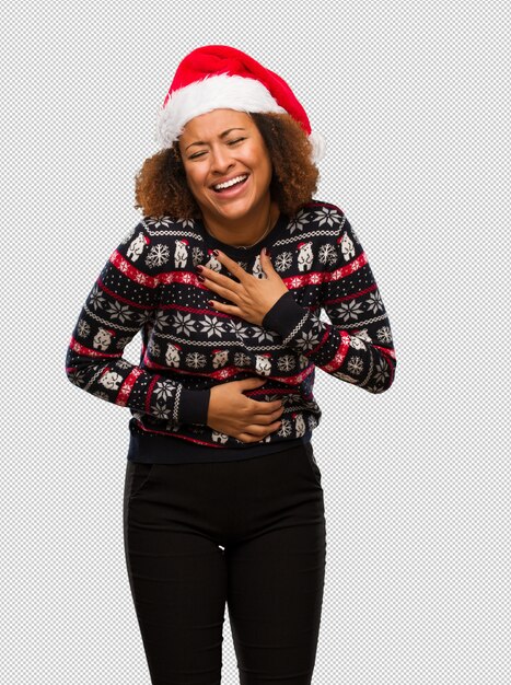 PSD young black woman in a trendy christmas sweater with print laughing and having fun