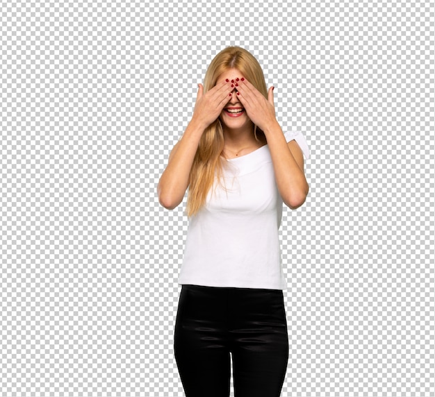 PSD young blonde woman covering eyes by hands. surprised to see what is ahead