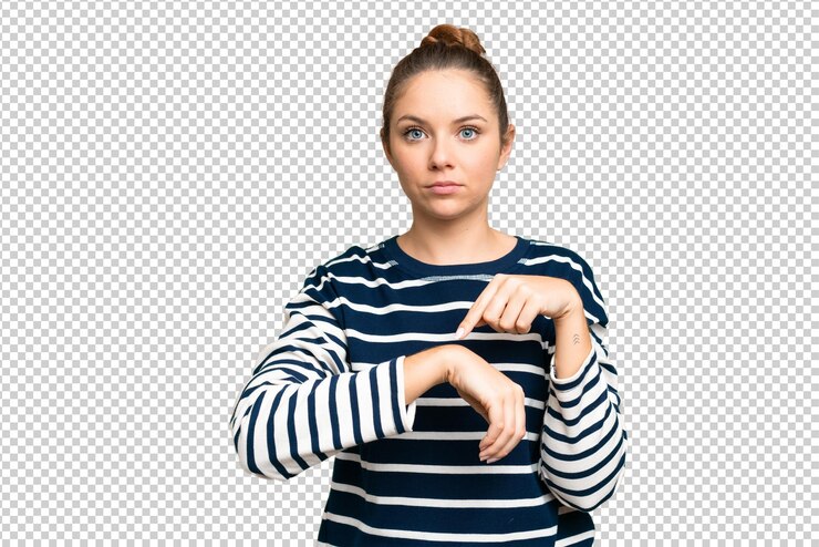 PSD young blonde woman over isolated chroma key background making the gesture of being late