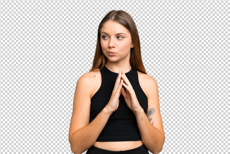 PSD young blonde woman over isolated chroma key background scheming something