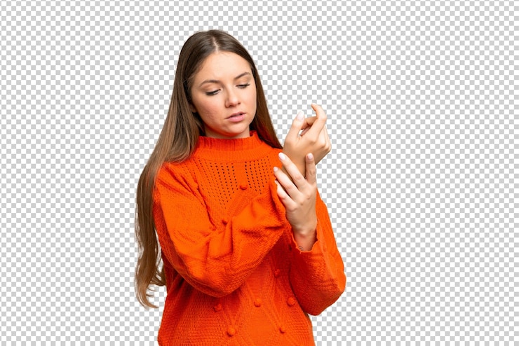 PSD young blonde woman over isolated chroma key background suffering from pain in hands