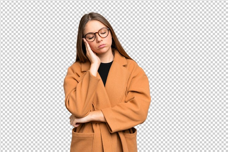 PSD young blonde woman over isolated chroma key background with headache