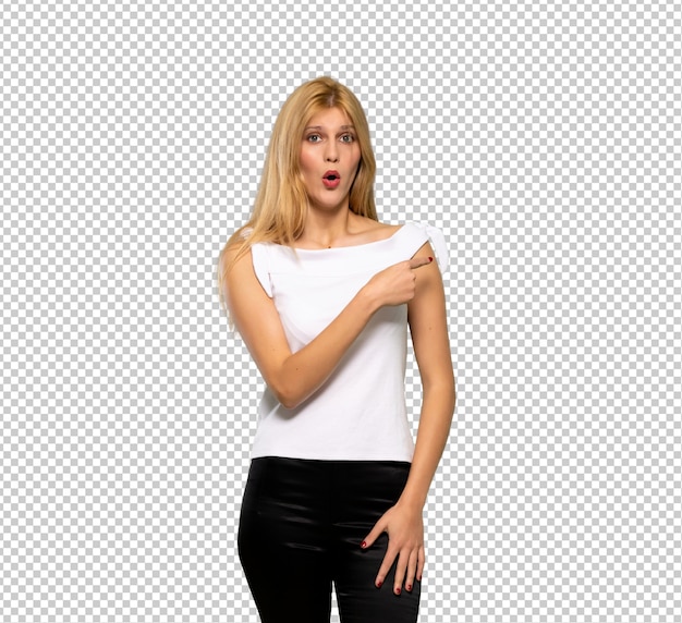 PSD young blonde woman surprised and pointing side