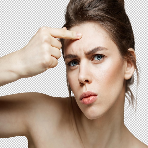 Young brunette girl displeased of her problem acne face skin over white background Health cosmetology and skincare