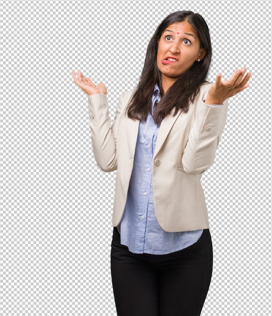 Young business indian woman crazy and desperate, screaming out of control