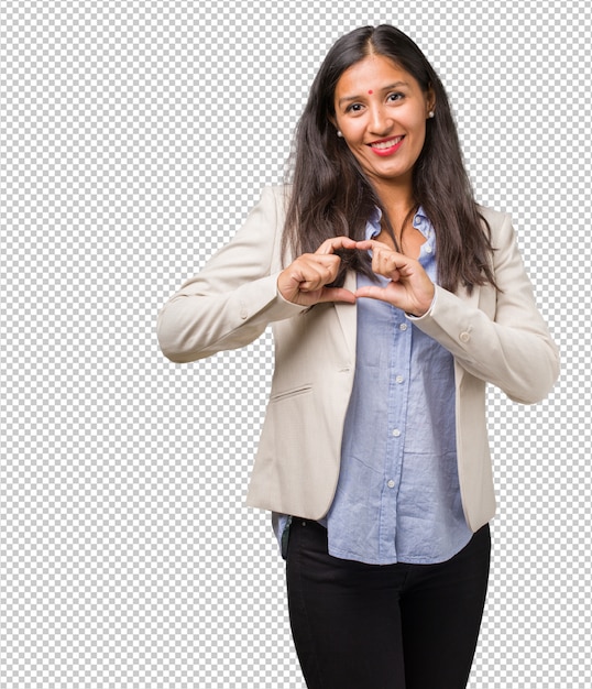 Young business indian woman making a heart with hands