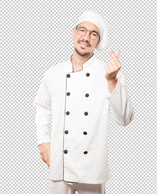 Young chef making a gesture of worried about his economy