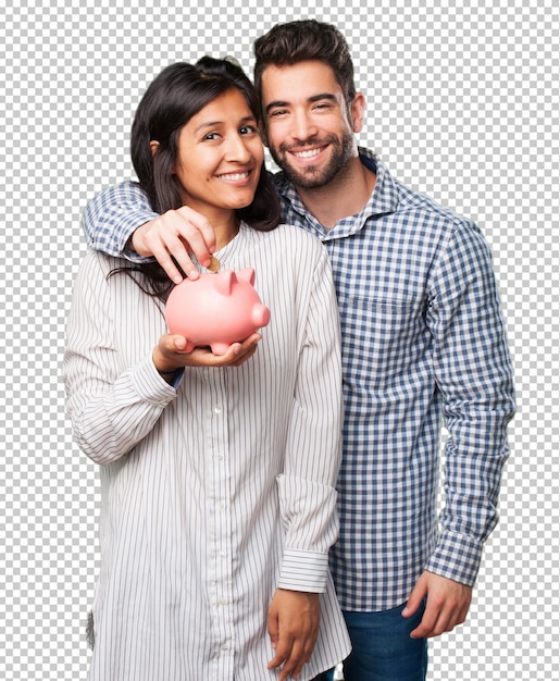 Young couple holding a piggy bank