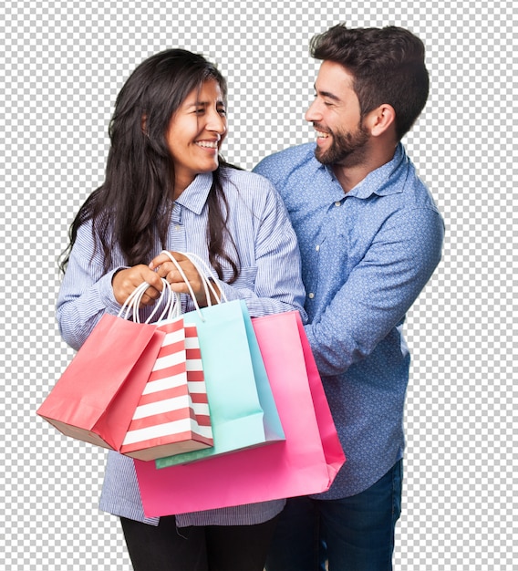 Young couple holding a shopping bags