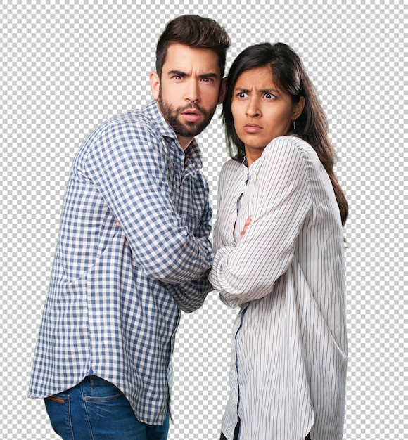 Young couple scared on white