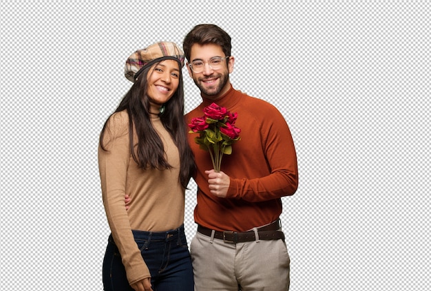 Young couple in valentines day cheerful with a big smile