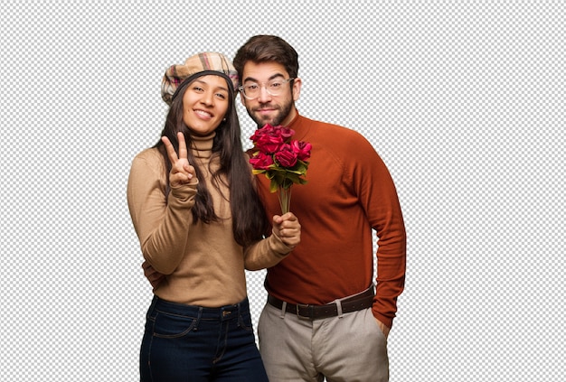 PSD young couple in valentines day showing number two