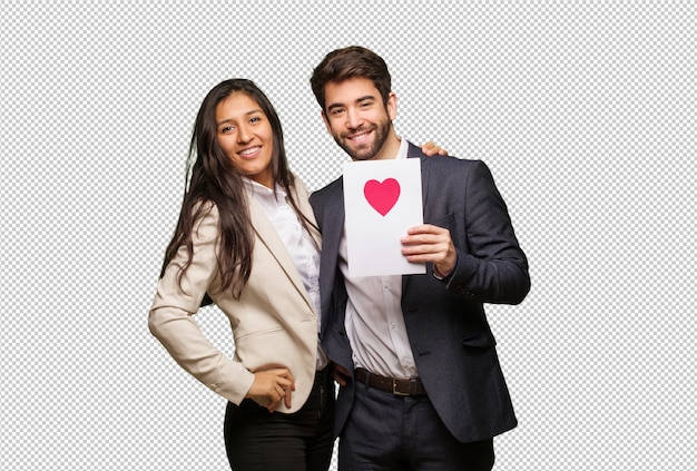 PSD young couple in valentines day with hands on hips