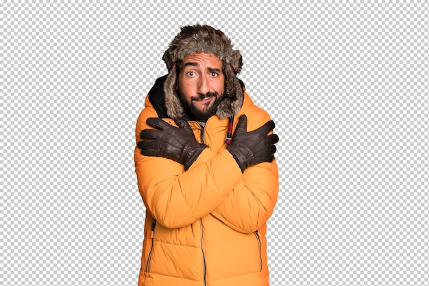 PSD young crazy bearded and expressive man cold and winter concept and wearing an anorak