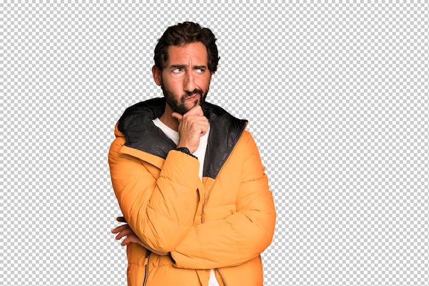 PSD young crazy bearded and expressive man cold and winter concept and wearing an anorak