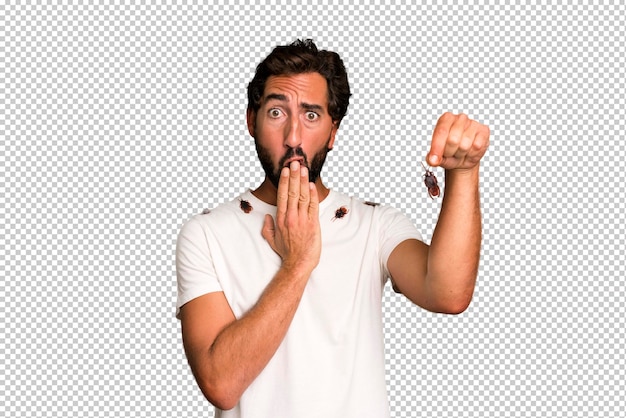 PSD young crazy bearded and expressive man holding an insect with the fingers