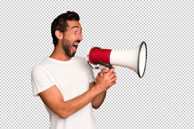 Young crazy bearded and expressive man using a megaphone to say a message