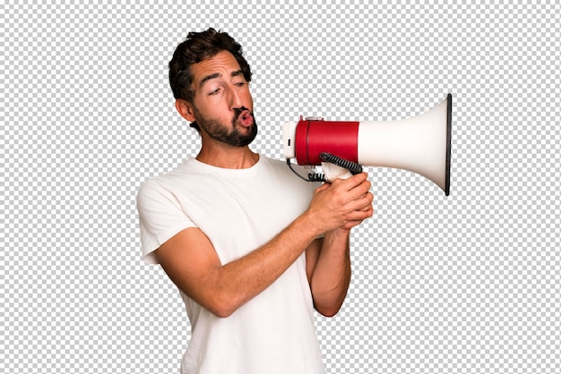 PSD young crazy bearded and expressive man using a megaphone to say a message